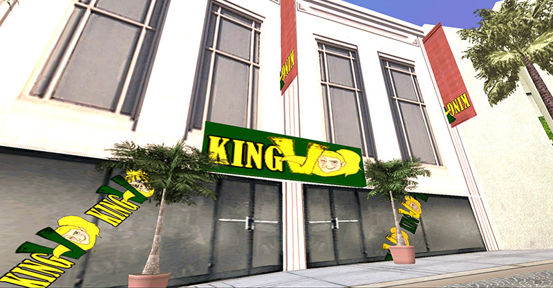 captura del local de king v visto por fuera, es un local con los carteles de king v y unas 
                                plantas en sus macetas